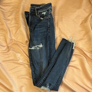 American Eagle Women's Next Level Stretch Ripped Dark Blue Skinny Jeans